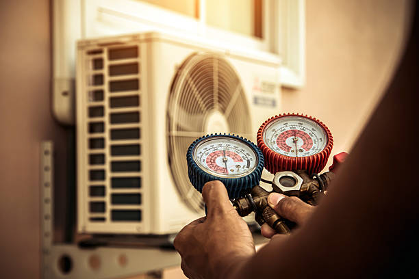 Professional Air Conditioning Service technician working in Valencia, CA